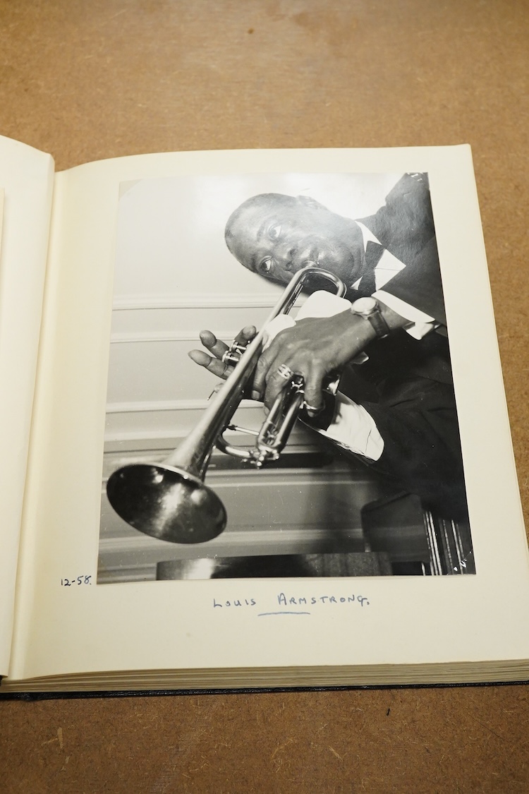 An album containing a wide selection of autographed publicity photographs of jazz and blues artists, including; Louis Armstrong, Chet Baker, Louis Bellson, Dave Brubeck, June Christy, Nat King Cole, Paul Desmond, Duke El
